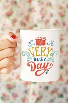 With just a hint of robin's egg blue, I love this Very Busy Day coffee mug.