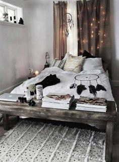 Good idea for a small bedroom. A slim table in front of the bed.