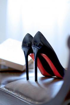 
                    
                        Christian Louboutin
                    
                