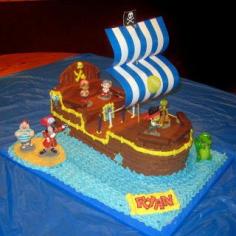
                    
                        DIY Bucky the Pirate Ship Cake: Jake and the Neverland Pirates Birthday Party. Made from 2 9x13 cakes with instructions on how to build and decorate!
                    
                
