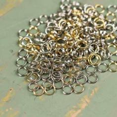 
                    
                        Silver and Gold Mini Split Rings
                    
                