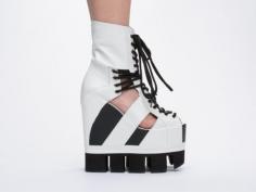 The #Chromat Sport Lace-Up Wedge (shown here in White with Black Sole) is an open-toe sport platform wedge sandal with detailed combat boot lacing and over 10 feet of shoelace! Features a custom Chromat tooth sole with a sturdy surface area base engineered for a strong stomp. | #chromatshoes | #shoes | #wedges | #platforms | #sandal | #athletic | #geometric | #cutout | #boot | #laces | #strongstomp http://www.solestruck.com/chromat-sport-lace-up-wedge-white-black/index.html