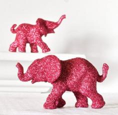 Hot pink glitter elephants are the way to go for sure. Want these for both party and home decor.