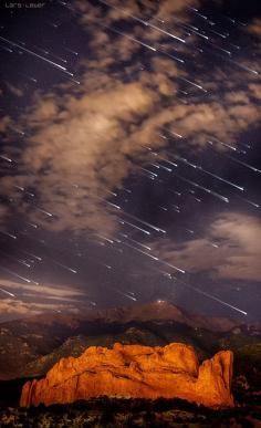 Meteor shower over Pikes Peak, Colorado. Light from the sun low on horizon make mountain cliffs stand out as bright orange, and make the falling stars seem to shine more brightly. UNIVERSE LIGHTS of the Milky Way http://www.pinterest.com/DianaDeeOsborne/universe-lights/ - ASTRONOMY. Consider: In Matthew 24, Jesus said one day the "moon will not give its light; the stars will fall from heaven." We always presumed meteors, shooting stars. But what if ROCKETS lights like now falling in Middle East?