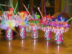 
                    
                        Soda can candy bouquets. Stick the straw directly in the foam first. Then just glue a styrofoam ball to the top of the can (a full can is better to make it bottom heavy) and add candy and decor with T-pins. kp/
                    
                