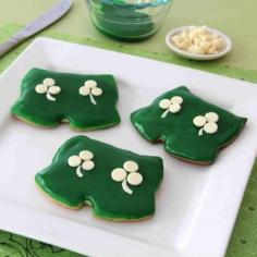 
                    
                        Decorated with white chocolate shamrock buttons, these festive cookies featuring Mickey Mouse are a perfect fit for a holiday party or classroom treat.
                    
                