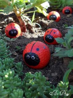 Golf balls painted as ladybugs...a cute idea for a garden to go with my bowling ball ladybug! Mama & her babies!