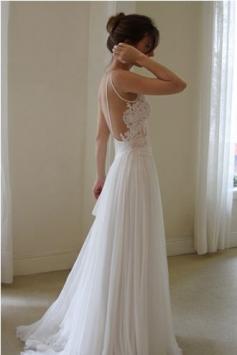 Embroidery and Flowing Wedding Dress, open back too! THIS is my dream dress!