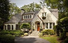 Soft white brick, white trim, smokey grey shutters, and an antiqued roof make for the perfect brick home! This is my absolute dream home!