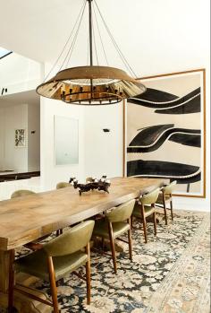 
                    
                        Modern dining space with structural chandelier
                    
                