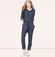 
                    
                        Chambray Jumpsuit - In soft linen-infused chambray, we love how this one-piece wonder achieves the perfect work-play balance. Jewel neck. Long sleeves. Hidden button placket. Roll cuffs with button tabs. Ruched elasticized waist. Front and back patch pockets. 26” inseam, rolled.
                    
                