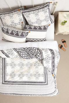 love the idea of black and white boho bedding