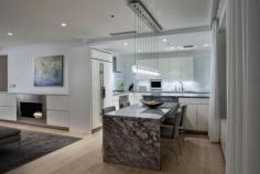 
                    
                        Love the globe pendant lights above this kitchen island.
                    
                