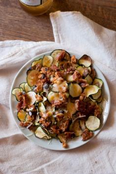 Zucchini chip Nachos with crumbled black bean burger and cheese