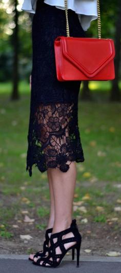 
                    
                        Black lace skirt and black black high heels
                    
                