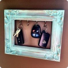 
                    
                        DIY Picture Frame Key Holder  ~cute. love the frame and the color. could do something like this to hang jewelry also.
                    
                