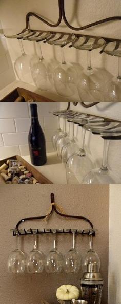 Use an old rake as a wineglass holder. we did this with wine glasses and everybody loves it the wind glasses had fruit decor on them and we but a grape wine wreath by the rake to tie it all together looks very nice