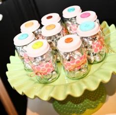
                    
                        baby food jars upcycled into party favors for girl's first birthday
                    
                