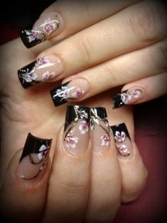 
                    
                        French Manicure with black tips and Cherry Blossoms.
                    
                