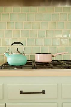 Loving the light light mint and the tile back splash! and the cute little kettle and pot!