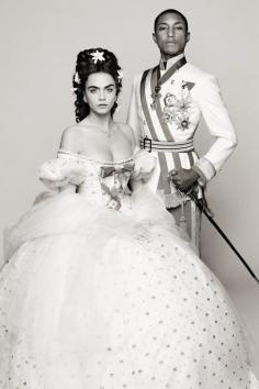 
                    
                        Cara Delevingne and Pharrell Williams in costume for "Reincarnation" by Karl Lagerfeld. [Photo by Karl Lagerfeld]
                    
                