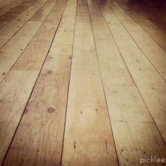 DIY:  Wide Plank Farmhouse Floor Tutorial - made from plywood + this post explains how to figure how many sheets of plywood you'll need for your project.  Try in playhouse.