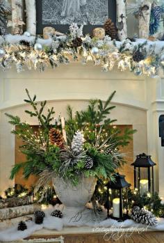 
                    
                        This icy woodland centerpiece and garland are so fabulous! Can't wait to start decorating for Christmas!
                    
                