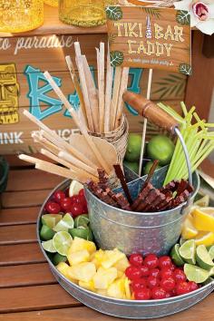 Luau Party Idea: offer an assortment of decorations and garnishes for the cocktails and refreshments at your tropical party