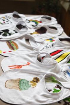 
                    
                        Baby shower idea: bib decorating. Everyone at the party gets a blank white bib and access to every color of fabric markers you can find.
                    
                