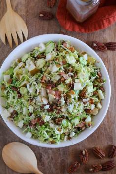 
                    
                        Brussels Sprout Chopped Salad with bacon, candied pecans, pears, blue cheese, and maple-bacon vinaigrette
                    
                