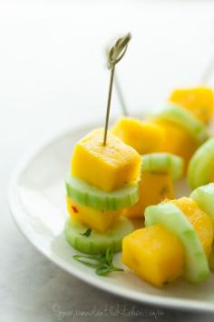 
                    
                        Spicy Mango Cucumber Salad Skewers. - Skewers of mango and cucumber dressed with fresh chili, lime and salt are an utterly refreshing collaboration of salty, sweet, tart and spicy tastes. -chili mango, mango skewers, cucumber skewers, salad skewers, summer appetizer -
                    
                