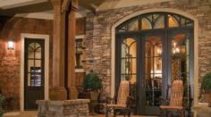 
                    
                        Love the transom on these wood doors. The design compliments the stone and cedar elements of the exterior well. doors.  front door. exterior design. curb appeal. dream home. custom wood doors.
                    
                