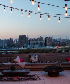 beanbrain:  refinery29: Is this the dreamiest NYC rooftop?  I dream of twinkling lights and urban breezes and the dull roar of metropolitan ...