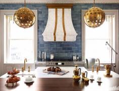 
                    
                        Blue and brass kitchen design
                    
                