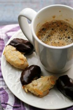 
                    
                        Chewy and full of rich almond flavor, these chocolate-glazed almond horns are quite the treat!
                    
                