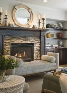 Stacked stone fireplace surround with wood mantle  |  Andrea's Innovative Interiors -  I'd paint the mantle white and accessorize with my beachy decor