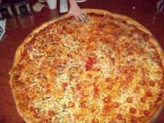 
                    
                        Big Lou's Pizza - pizza 3.5 feet wide  try the BBQ brisket pizza
                    
                
