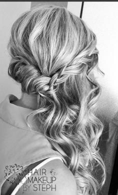 prom hair. curl hair in mermaid waves, make two large messy/loose braids to connect around at the back of head. Now take the left side of your hair hanging beneath the braid and pull it over and then under to the right of the leftside braid. Viola! Now your hair sits prettily to the right, mermaid loose wonderfulness! You can do on left side if you like your hair to sit there more than the right side. (: