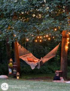
                    
                        Is there anything more soothing than a hammock gently swinging under string lights?
                    
                