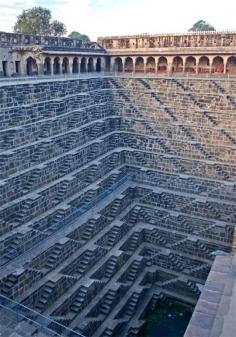 Chand Baori, India.   As you guys know we travel a lot but when you see places like this you realize there are still a lot of amazing places to visit on this planet.  Chand Baori was built in the 9th Century and is the world’s deepest step well.  You had to be in top shape to walk back up those stairs with buckets of water.  See more pics after the jump…