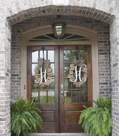 Wooden Monogram Wreathes, but what I love is the doors.
