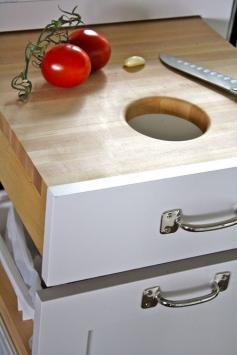 Great kitchen idea. Cutting board drawer with a hole over the compost bin.