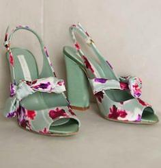 
                    
                        Mint floral heels with bow detail
                    
                