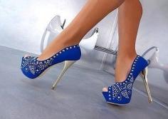 
                    
                        Lovely Blue dotted in gold high heels look very cool with any other blue wearing piece like dress.
                    
                