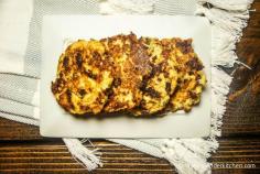 
                    
                        Cheesy, crispy, and low carb Cauliflower Fritters that make a great entree, side dish, or vegetarian burger!  Just 161 calories and 4 PointsPlus for 2 fritters.
                    
                