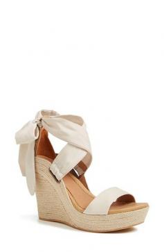 
                    
                        Love the bow in the back /// #wedges #summer #shoes
                    
                