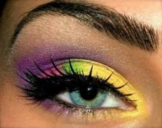 Rainbow Eye Makeup...kinda crazy eye makeup style...I do like the fact that her eyebrows are nicely arched tho...