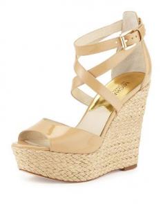 
                    
                        Gabriella Patent Leather Wedge Sandal, Nude by MICHAEL Michael Kors at Neiman Marcus.
                    
                