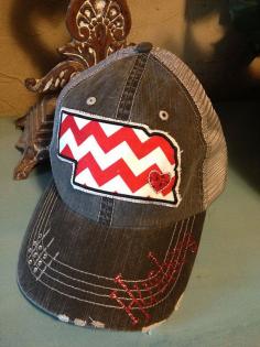 
                    
                        University of Nebraska Huskers Cornhusker State Baseball Bling Ladies Womens Trucker Hat - supposedly, since I now live in Nebraska, I need Husker gear or they will kick me out of the state.
                    
                