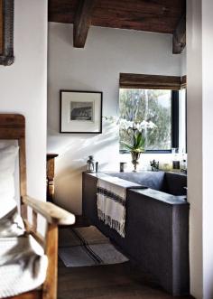 Masculine Black Concrete Soaking Tub, Rustic Bathroom.